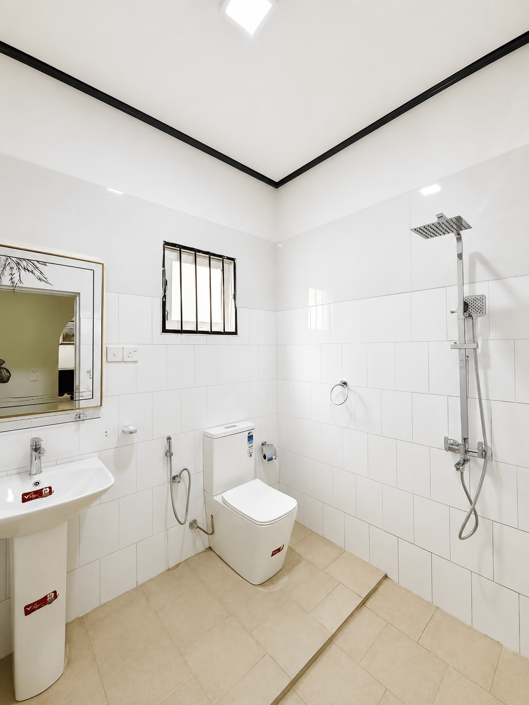 Bright private bathroom with shower and basin