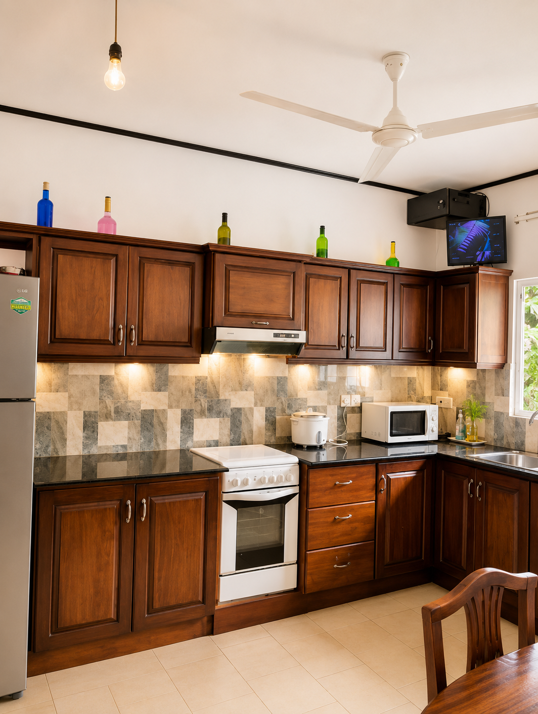 Private kitchen with wooden cabinets and appliances